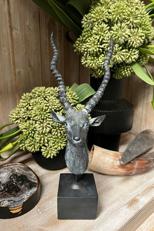 Antelope Sculpture on a Black Stand