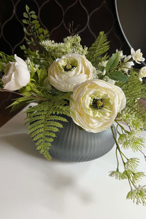 Ranunculus and Fern in a Blue Grey Glass Fluted Bowl