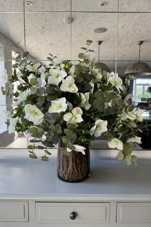 Hellebores, Eucalyptus and Twig in a Black Glass Vase