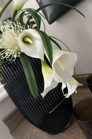 Calla Lily and Protea n a Black Ridged Vase