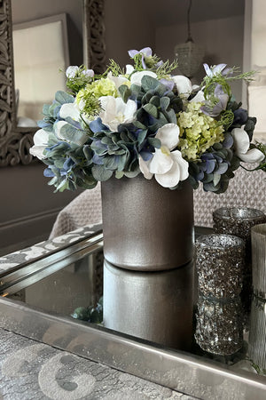Hydrangea, Snowball, Nigella and Orchids in a Champagne Bronze Vase ( Blue)