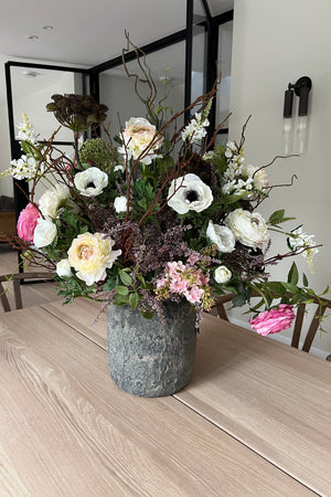 Ranunculus, Anemone, Lilac in a Stone Vase