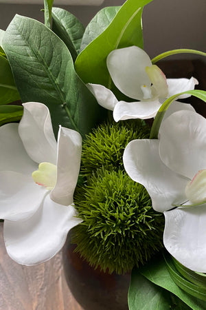 Vanda Orchid, Dianthus and Laurel in a Copper Vase
