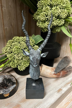 Antelope Sculpture on a Black Stand