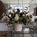 Pittosporum, Roses, Eucalyptus and Platanus in a Stone Textured Vase