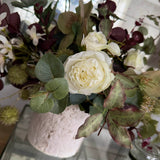 Pittosporum, Roses, Eucalyptus and Platanus in a Stone Textured Vase