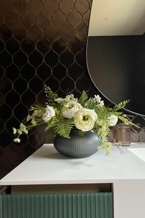 Ranunculus and Fern in a Blue Grey Glass Fluted Bowl