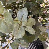 Eucalyptus and Waxflower in a Grey Ribbed Glass Vase