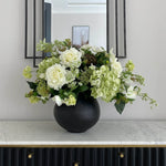 Hellebores, Roses and Snowball in a Black Metal Vase RTfact Flowers 