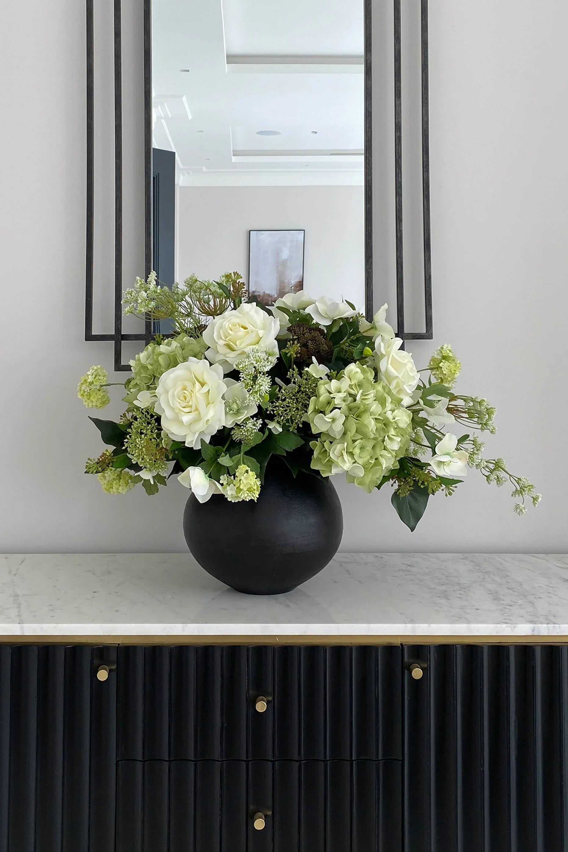 Hellebores, Roses and Snowball in a Black Metal Vase RTfact Flowers 