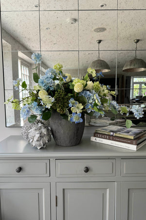 Hydrangea, Nigella, Roses and Ivy in a Stone Vase