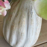 Blossom, Hellebore and Hydrangea in a Glazed Ceramic Vase