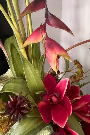 Heliconia and Orchids in Amber Glass Vases