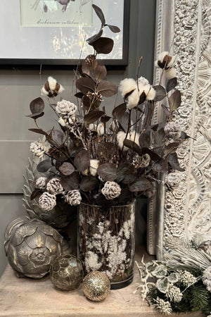 Eucalyptus, Cotton and Frosted Pine Cone in a Snow filled Glass Cylinder