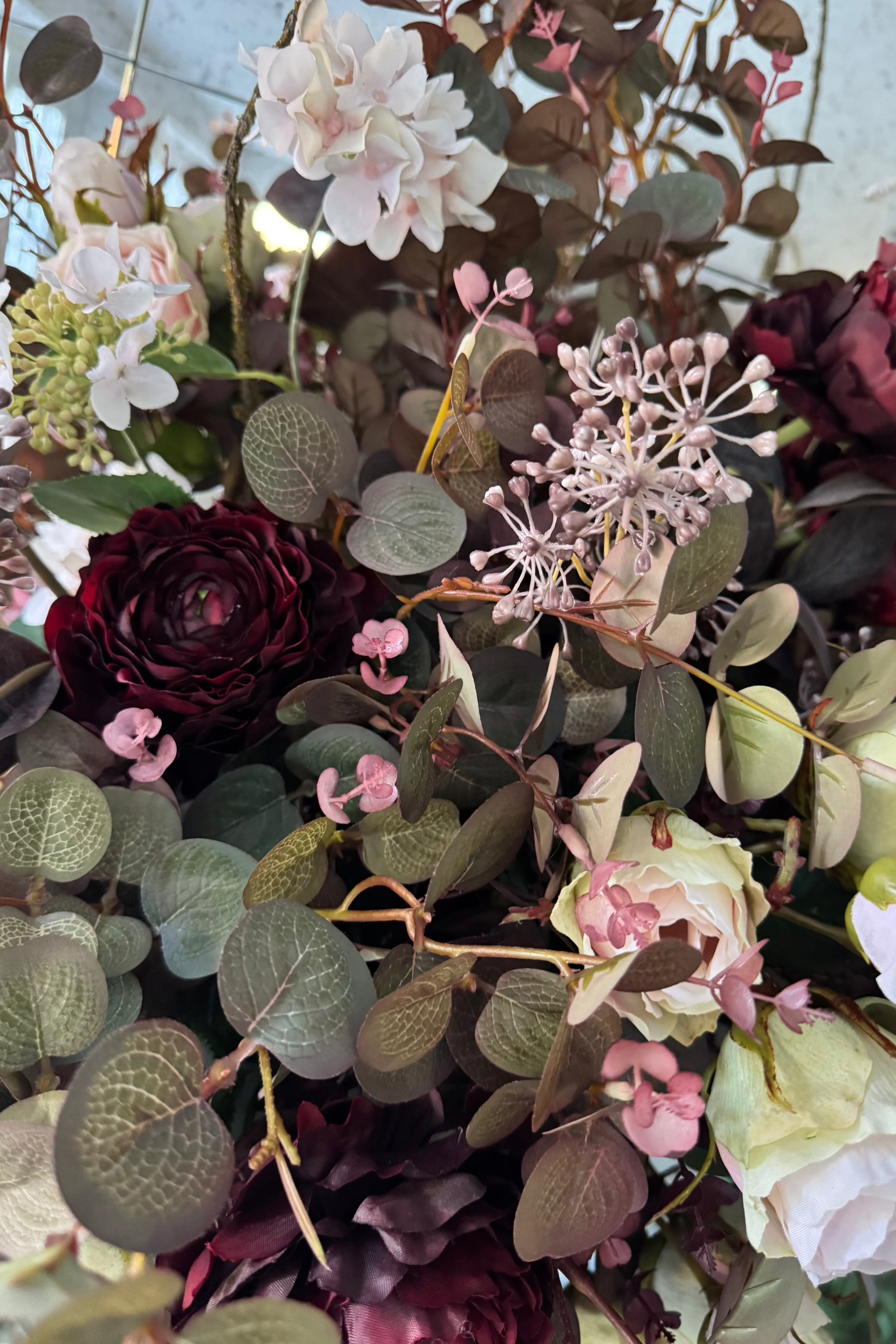 Eucalyptus, Rose and Ranunculus in a Ribbed Gold Metal Vase RTfact Flowers 