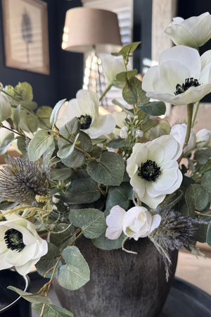 Anemone, Thistle and Gypsophila in a Dark Grey Terracotta pot