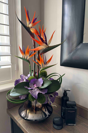Faux Tropical Birds of Paradise and Vanda Orchids in a Metallic Glass Vase