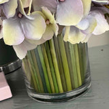 Hydrangea, Rose & Ranunculus in a Stem Lined Cylinder (Lilac)