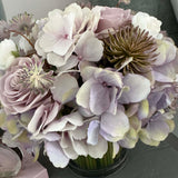 Hydrangea, Rose & Ranunculus in a Stem Lined Cylinder (Lilac)