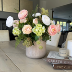 Ranunculus, Viburnum and Skimmia in a Taupe Glass Vase RTfact Flowers 