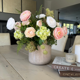 Ranunculus, Viburnum and Skimmia in a Taupe Glass Vase RTfact Flowers 