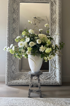 Ranunculus, Hydrangea and Viburnum in a Glazed White Vase