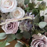 Eucalyptus, Rose and Ranunculus in a Champagne Rose Boat