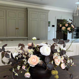 Ranunculus, Eucalyptus and Platanus in a Dark Brown Vase