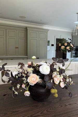 Ranunculus, Eucalyptus and Platanus in a Dark Brown Vase