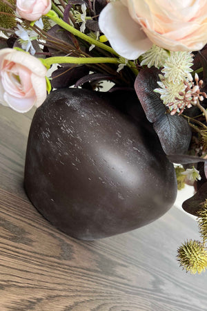 Ranunculus, Eucalyptus and Platanus in a Dark Brown Vase