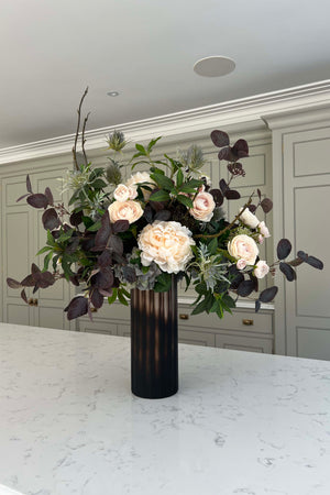 Faux Flowers Ranunculus, Hydrangea and Eucalyptus in a Dark Brown Frosted Glass Vase Rtfact Interior design