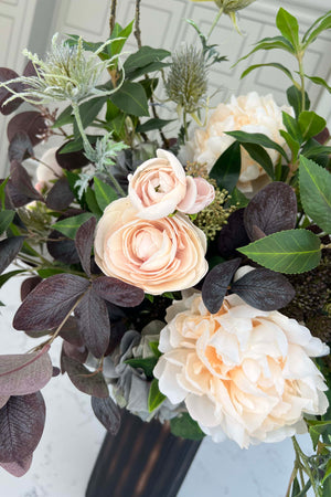 Ranunculus, Hydrangea and Eucalyptus in a Dark Brown Frosted Glass Vase