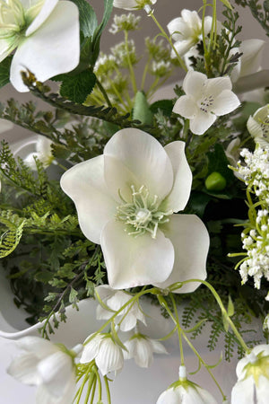 Hellebore, Fern and Queen Anne's Lace in a Matt White Vase