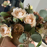 Rose, Echinops and Eucalyptus in a Bronze Vase