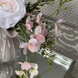 Ranunculus and Larkspur Spray in a Ribbed Glass Vase (Pink)