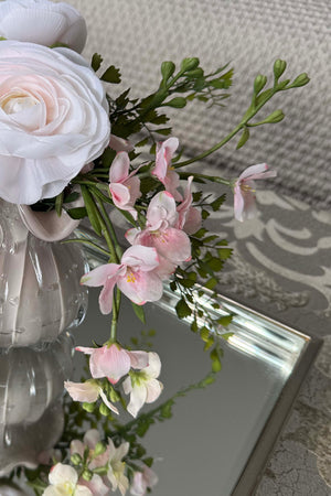 Ranunculus and Larksprum Spray in a Ribbed Glass Vase