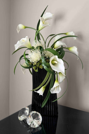 Calla Lily and Protea in a 'Twisted' Black Ribbed Vase