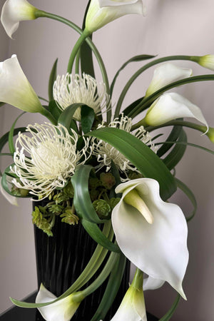 Calla Lily and Protea in a 'Twisted' Black Ribbed Vase