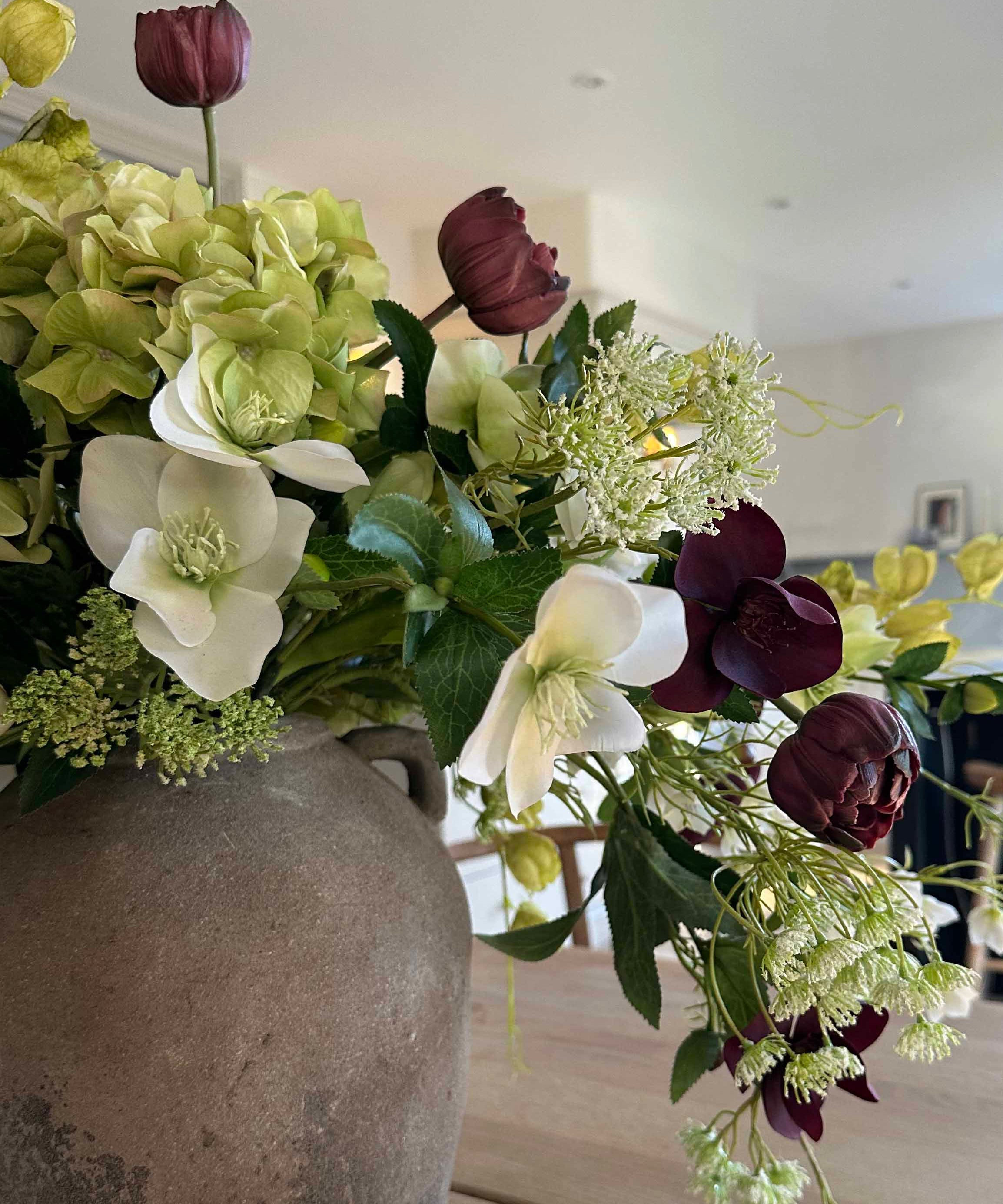 Hellebore, Tulips and Queen Anne's Lace in a Rustic Vase