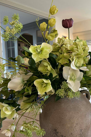 Hellebore, Tulips and Queen Anne's Lace in a Rustic Vase
