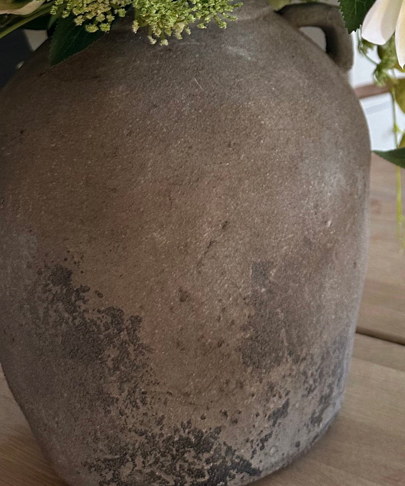 Hellebore, Tulips and Queen Anne's Lace in a Rustic Vase