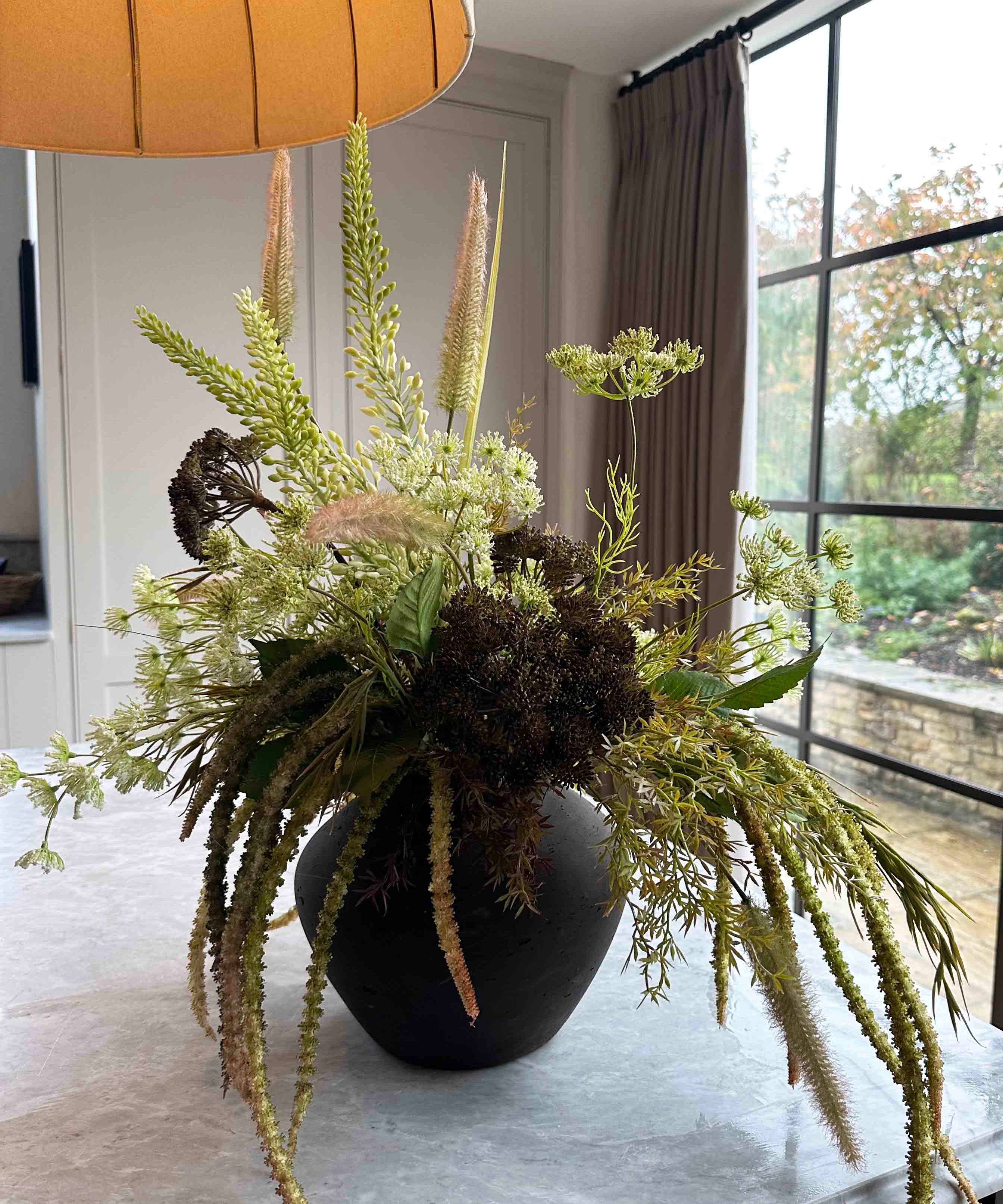 Angelica, Eremurus and Queen Anne's Lace in a Rustic Brown Vase