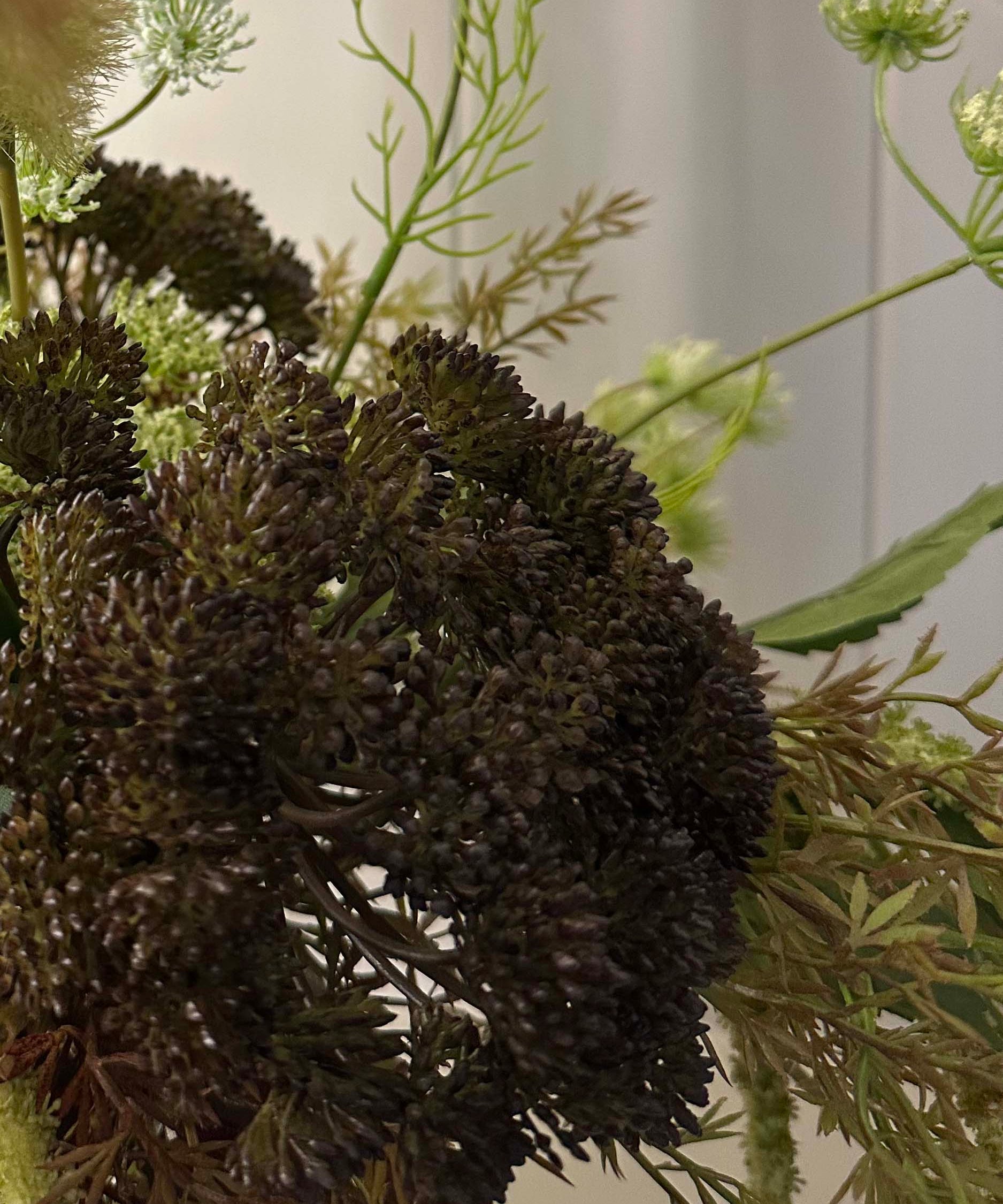 Angelica, Eremurus and Queen Anne's Lace in a Rustic Brown Vase