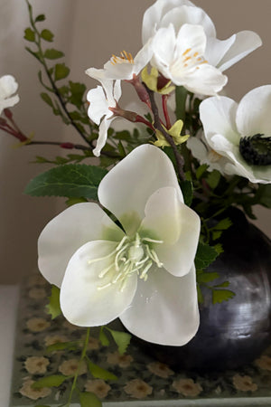 Blossom, Hellebore and Anemone in a Metal Ridged Vase