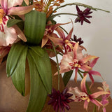 Orchid, Eremurus and Amarylis in a Crackled Glass Vase