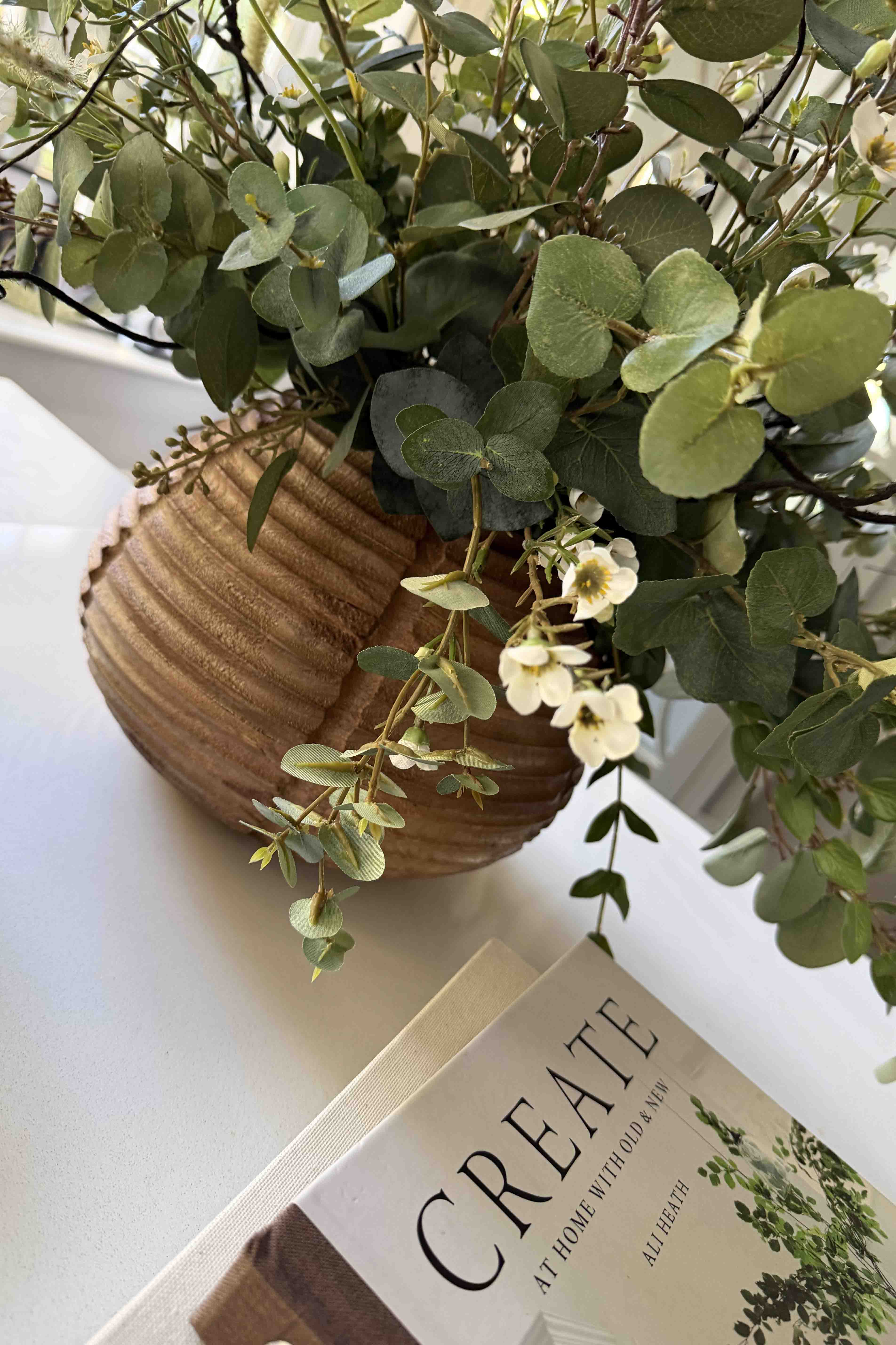 Wax Flower and Eucalyptus in a Carved Wooden Vase - to shoot RTfact Flowers 