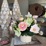 Ranunculus, Hellebores and Skimmia in a Cream Glazed Vase RTfact Flowers 