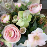 Ranunculus, Hellebores and Skimmia in a Cream Glazed Vase RTfact Flowers 