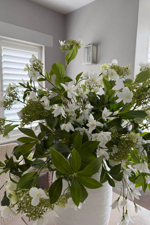 Hydrangea, Vibernum and Bucida in a White Stone Vase