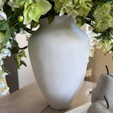 Bucida, Hellebores, Ranunuculus and Hydrangea in a White Matt Vase Rtfact Flowers 